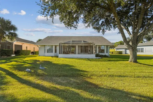 a view of a house with a swimming pool