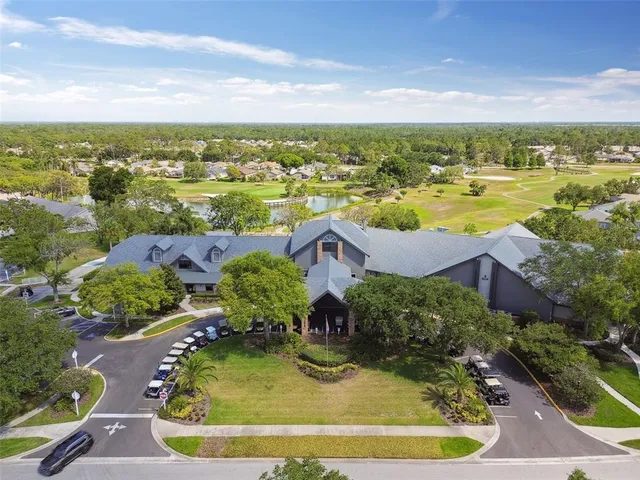 an aerial view of a house with a garden
