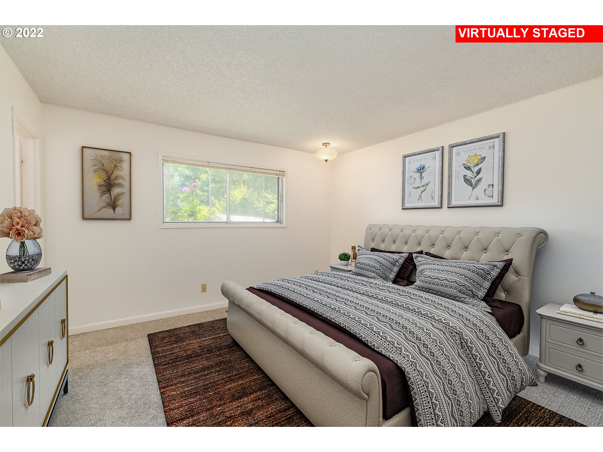 10880 Southwest Pathfinder Way Tigard, OR 97223 - Photo 11 of 26 a bedroom with a bed and a window