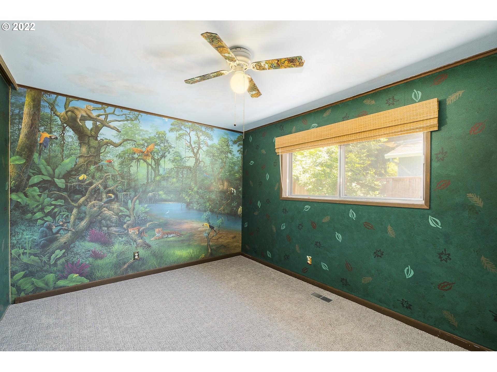 10880 Southwest Pathfinder Way Tigard, OR 97223 - Photo 15 of 26 a view of an empty room with a window