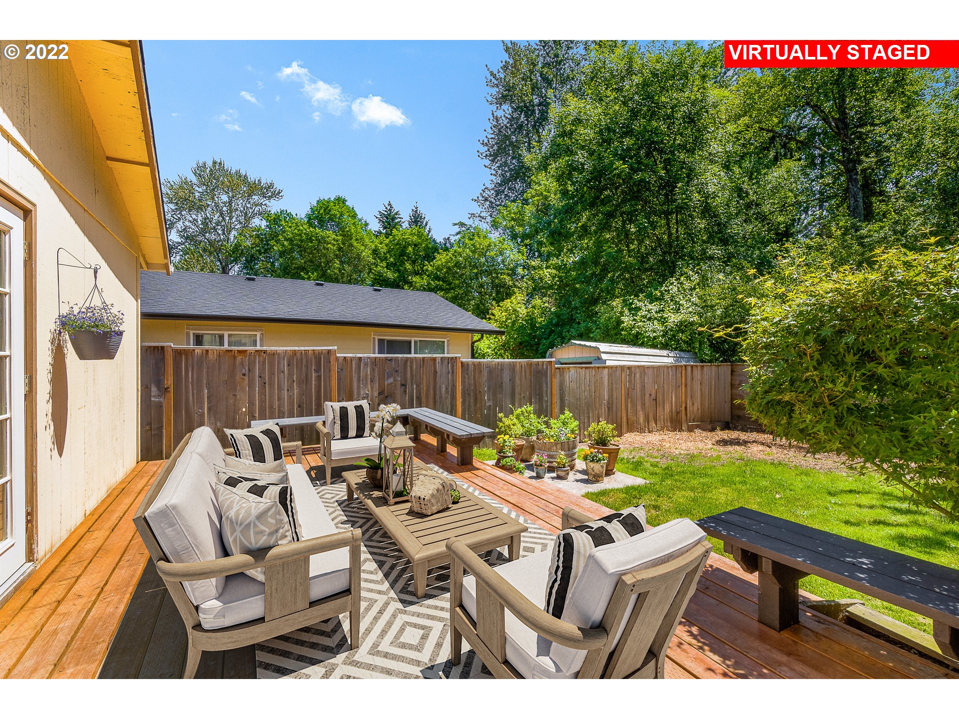 10880 Southwest Pathfinder Way Tigard, OR 97223 - Photo 18 of 26 a view of a patio with couches chairs and a table