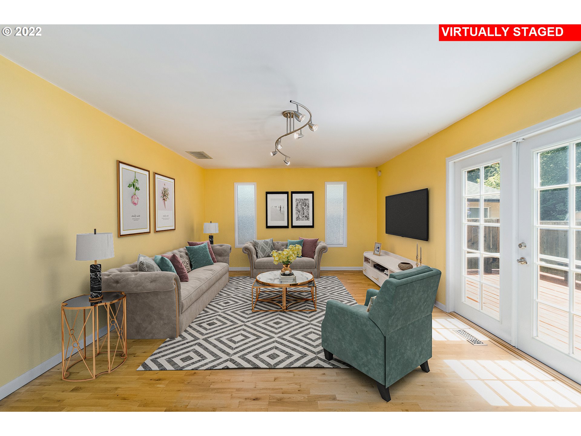 10880 Southwest Pathfinder Way Tigard, OR 97223 - Photo 7 of 26 a living room with furniture and a flat screen tv