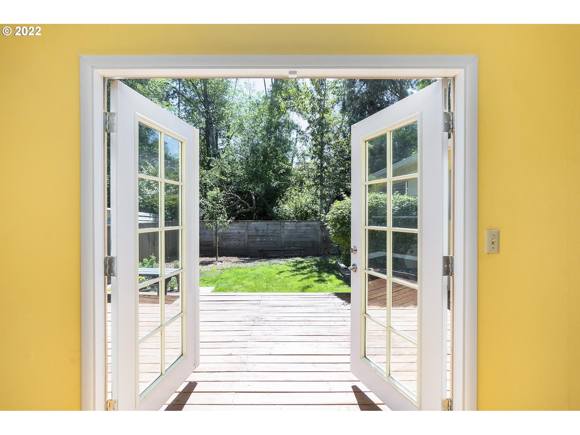 10880 Southwest Pathfinder Way Tigard, OR 97223 - Photo 9 of 26 a view of front door and yard