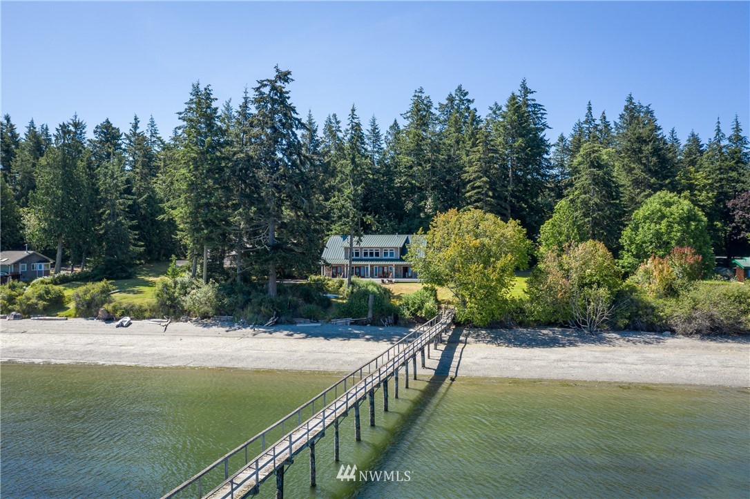 525 Port Stanley Road Lopez Island, WA 98261 - Photo 2 of 28 a view of a garden with a bench