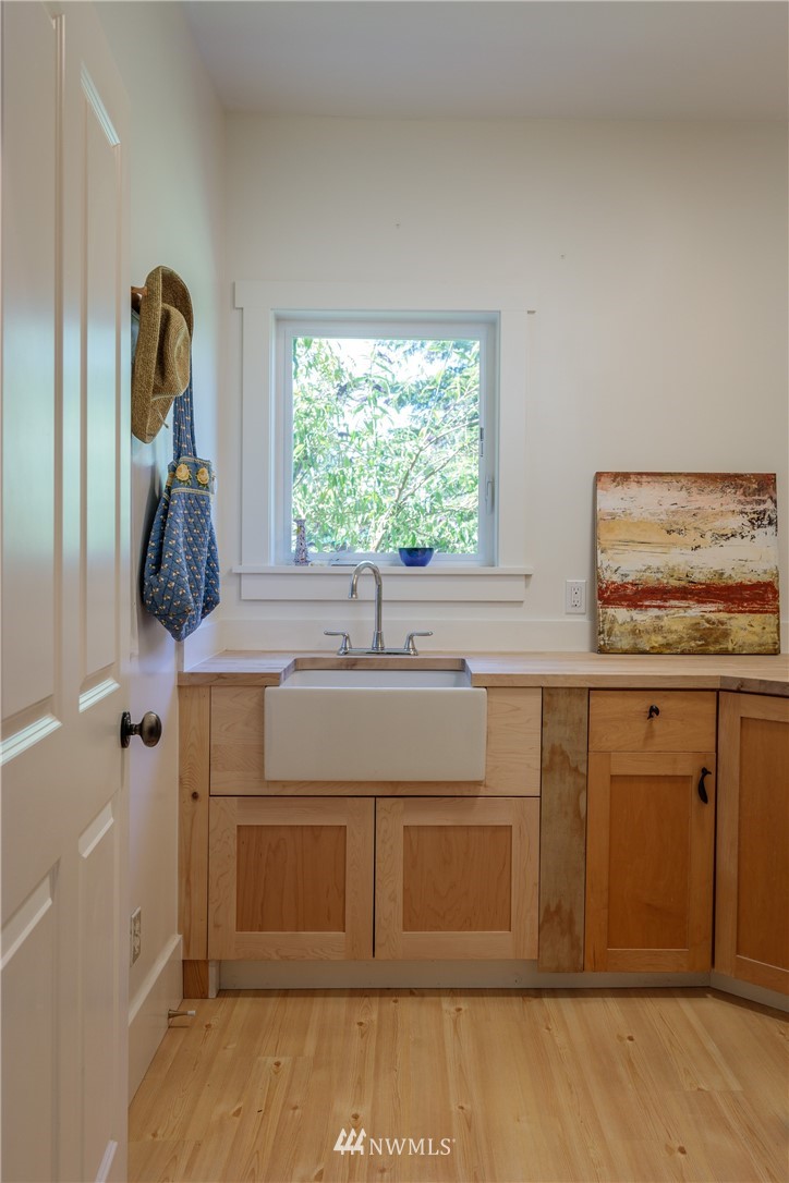 525 Port Stanley Road Lopez Island, WA 98261 - Photo 16 of 28 a bathroom with a sink and a mirror