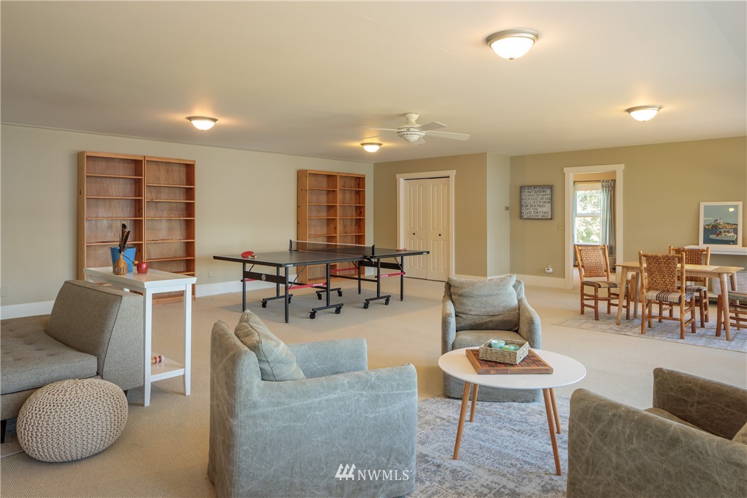 525 Port Stanley Road Lopez Island, WA 98261 - Photo 18 of 28 a living room with furniture and wooden floor
