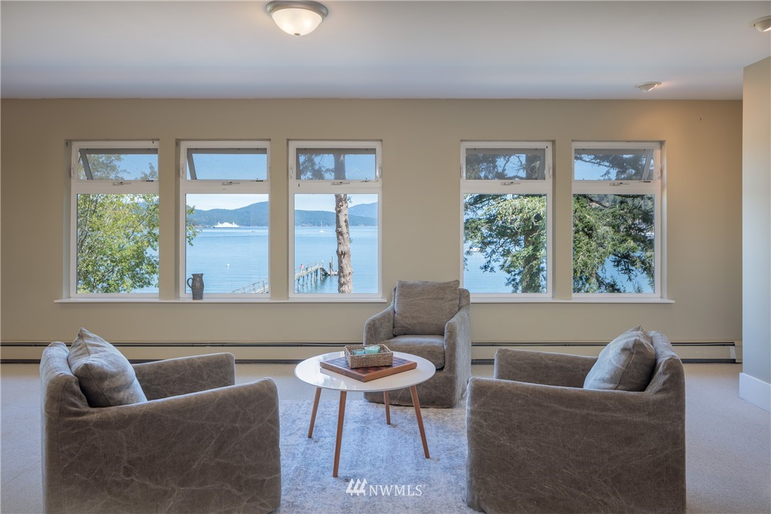 525 Port Stanley Road Lopez Island, WA 98261 - Photo 19 of 28 a living room with furniture and a window