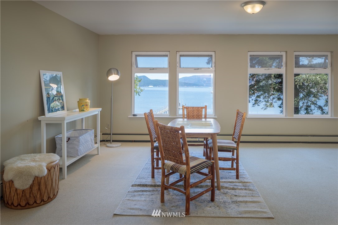 525 Port Stanley Road Lopez Island, WA 98261 - Photo 20 of 28 a dining room with furniture and window