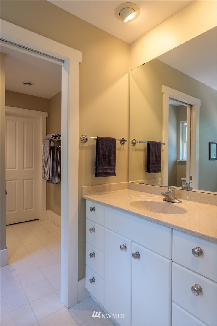 525 Port Stanley Road Lopez Island, WA 98261 - Photo 22 of 28 a bathroom with a sink and mirror