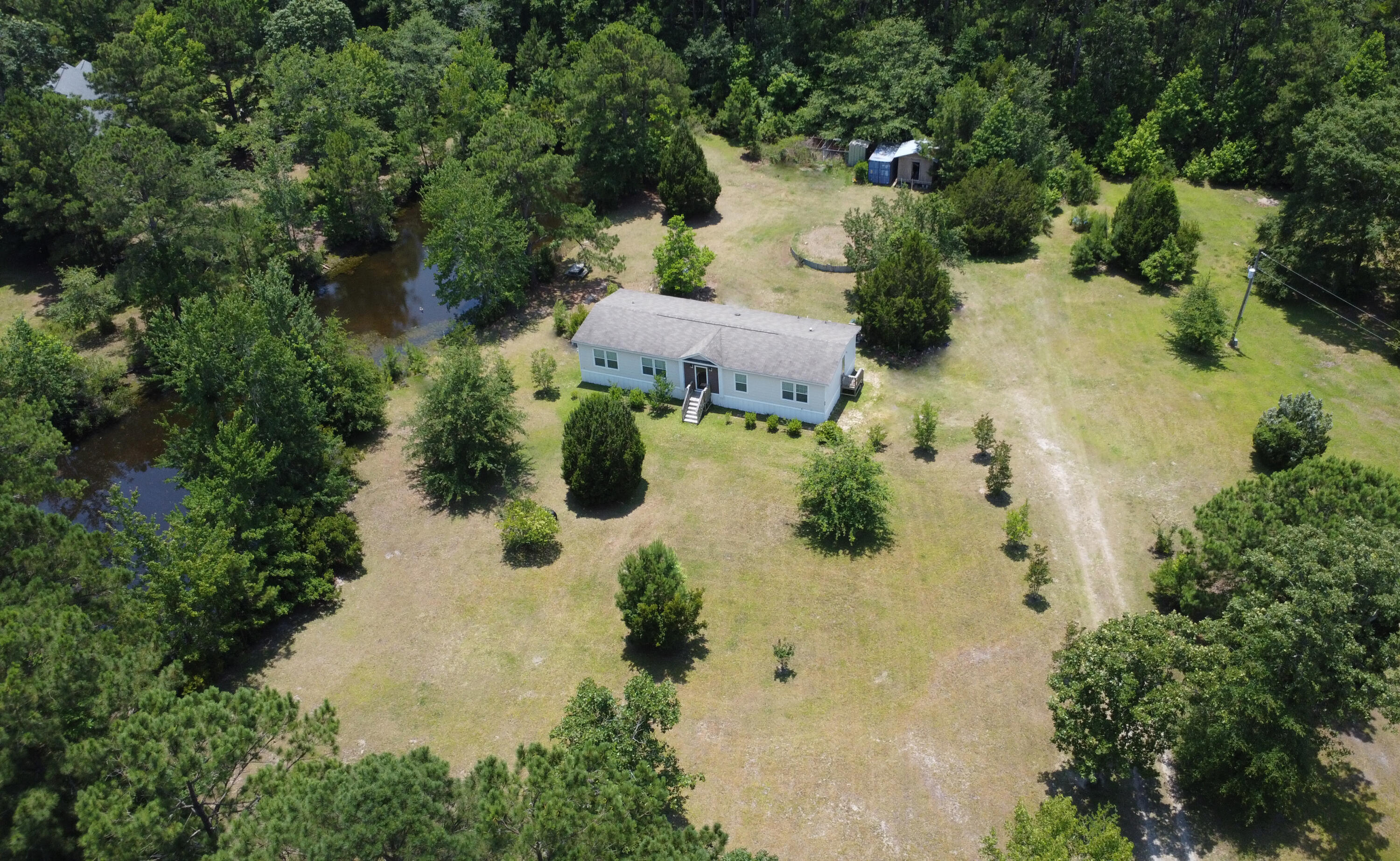 8142 Doar Road Awendaw, SC 29429 - Photo 1 of 31 1-aerial-home-front