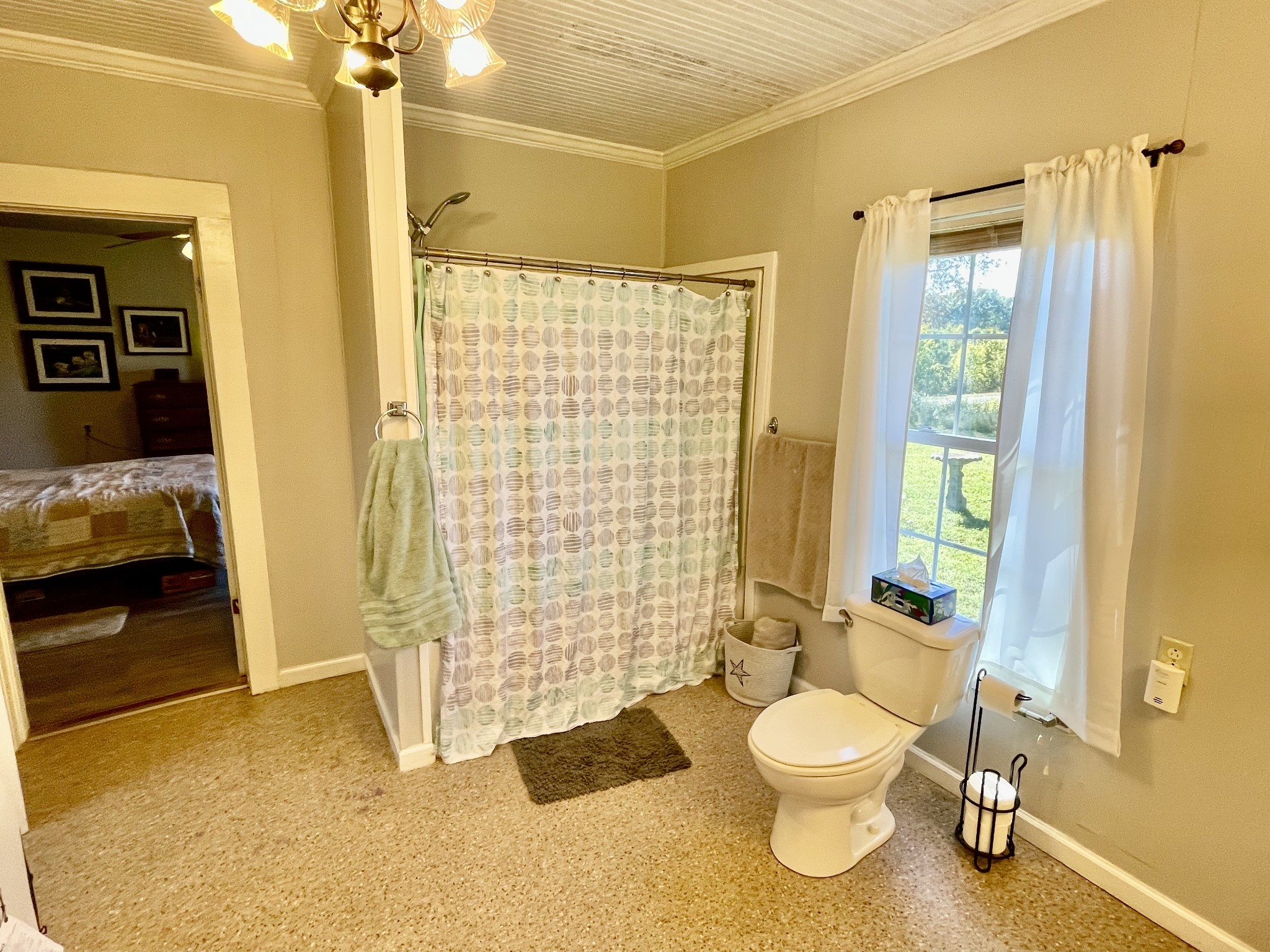 319 Jim Jackson Road Humboldt, TN 38343 - Photo 16 of 63 a bathroom with a granite countertop toilet a sink and a shower