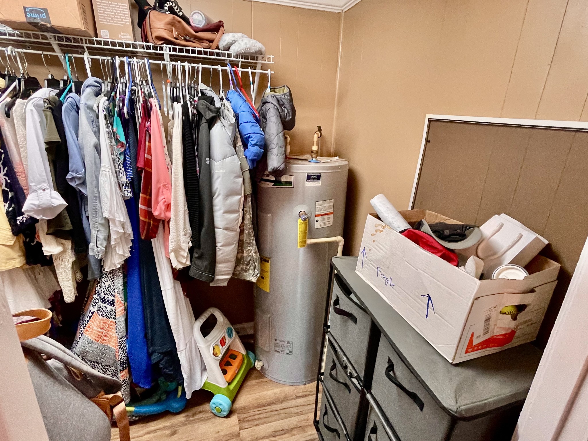 319 Jim Jackson Road Humboldt, TN 38343 - Photo 22 of 63 a view of walk in closet with clothes and shoes