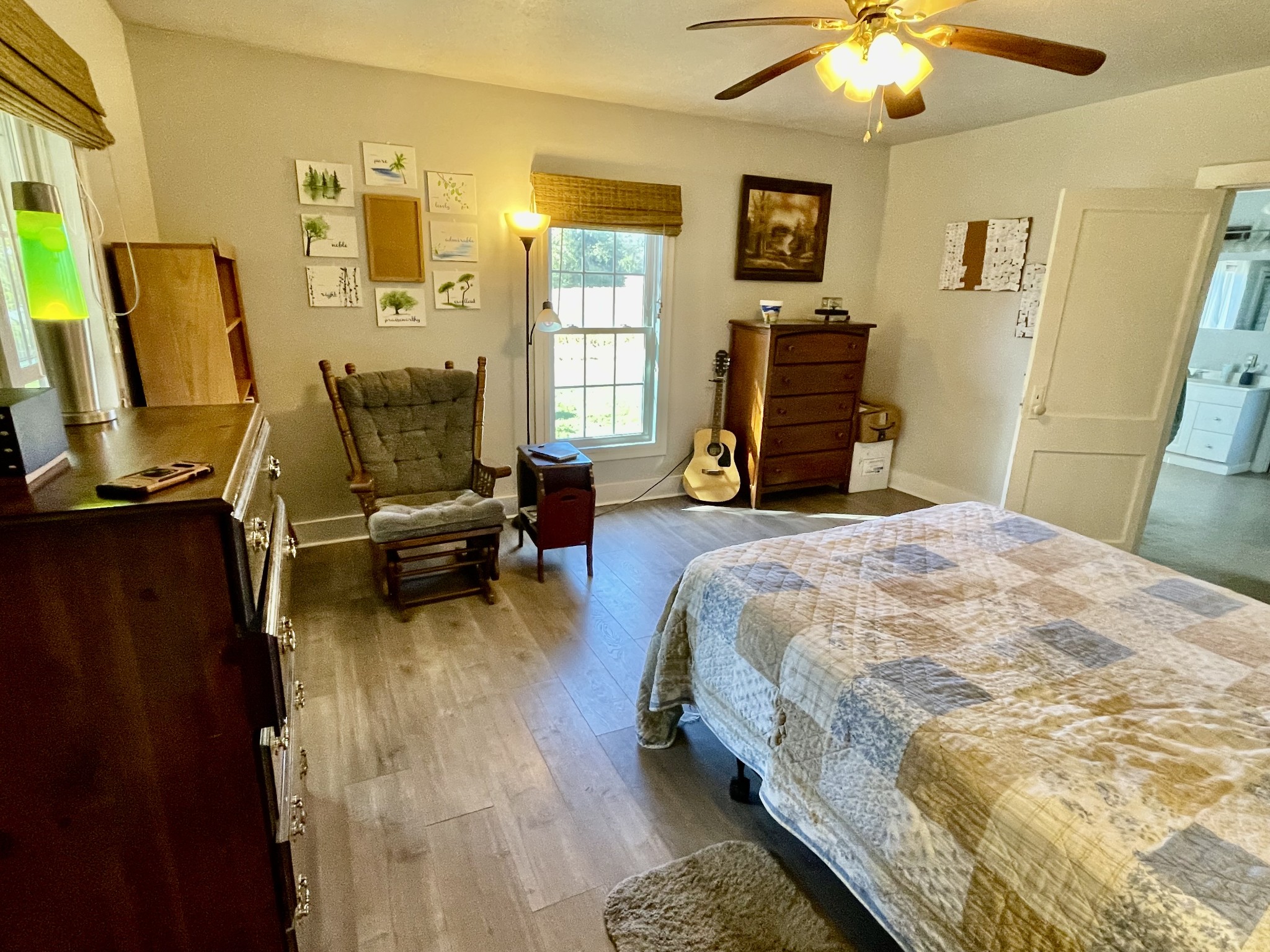 319 Jim Jackson Road Humboldt, TN 38343 - Photo 26 of 63 a spacious bedroom with a bed and wooden floor