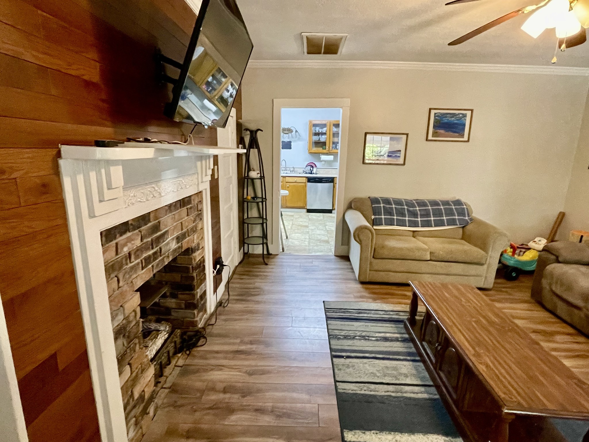 319 Jim Jackson Road Humboldt, TN 38343 - Photo 4 of 63 a bedroom with furniture and a fireplace