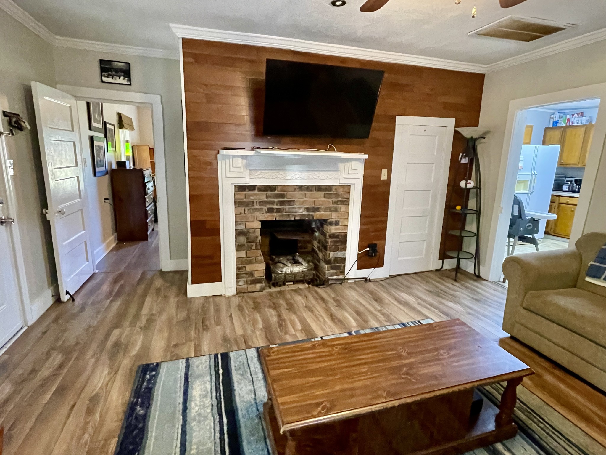 319 Jim Jackson Road Humboldt, TN 38343 - Photo 5 of 63 a living room with furniture and a fireplace