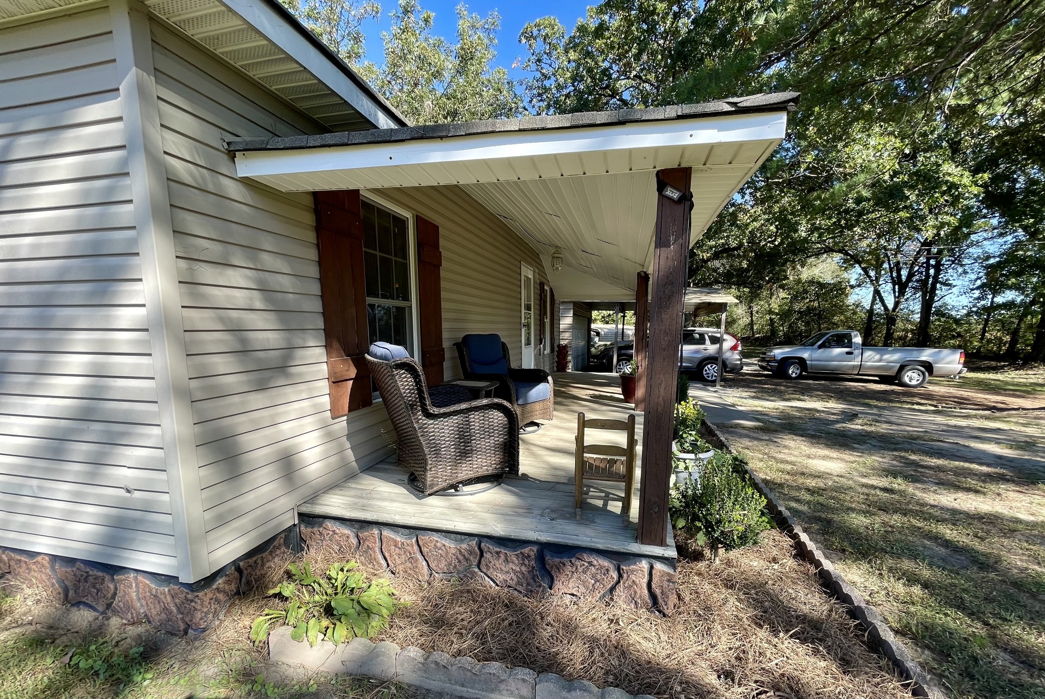 319 Jim Jackson Road Humboldt, TN 38343 - Photo 63 of 63 a view of a patio with table and chairs with wooden floor and fence