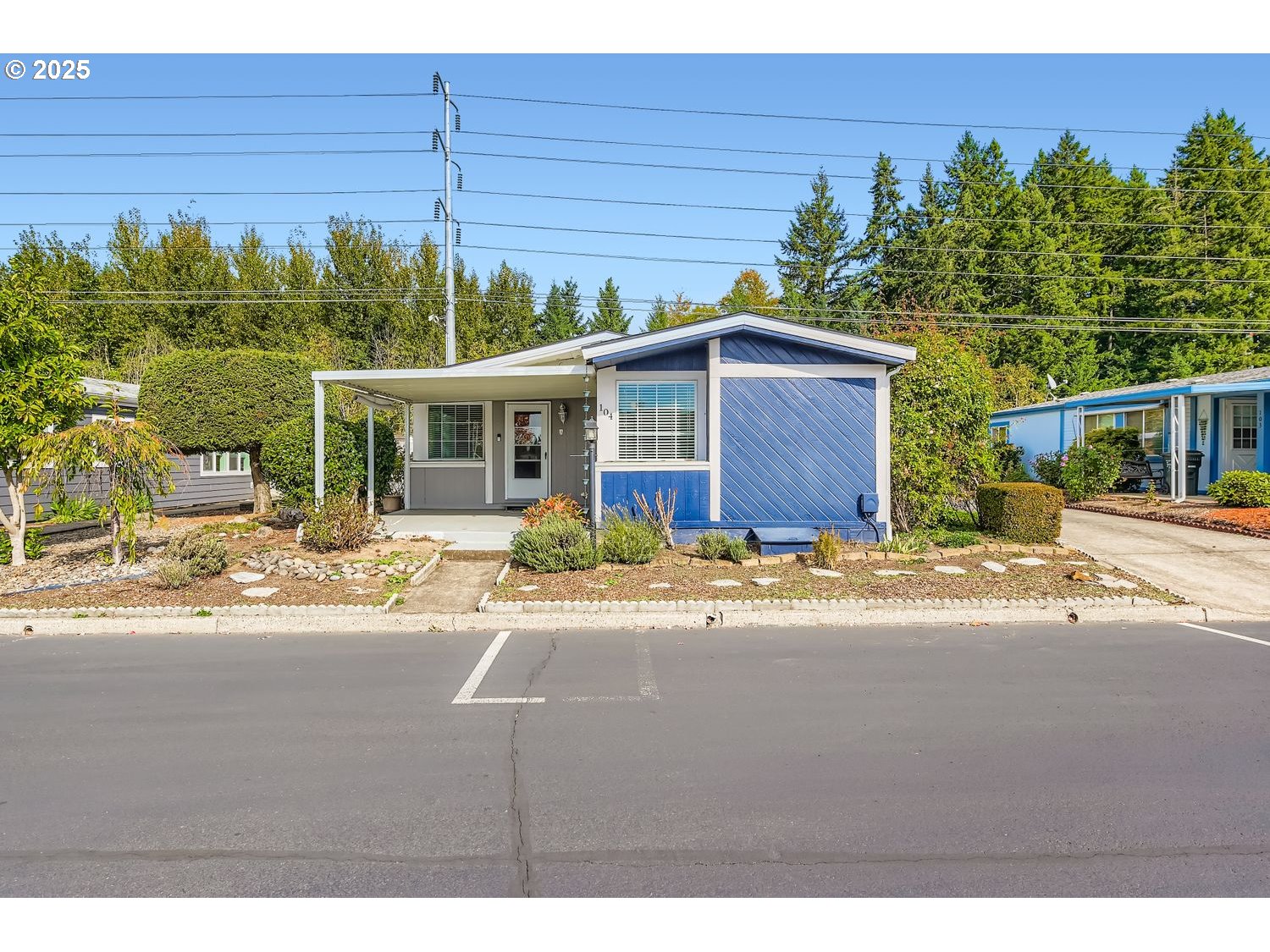 100 Southwest 195th Avenue, Unit 104 Beaverton, OR 97006 - Photo 1 of 23 a view of a house with a patio