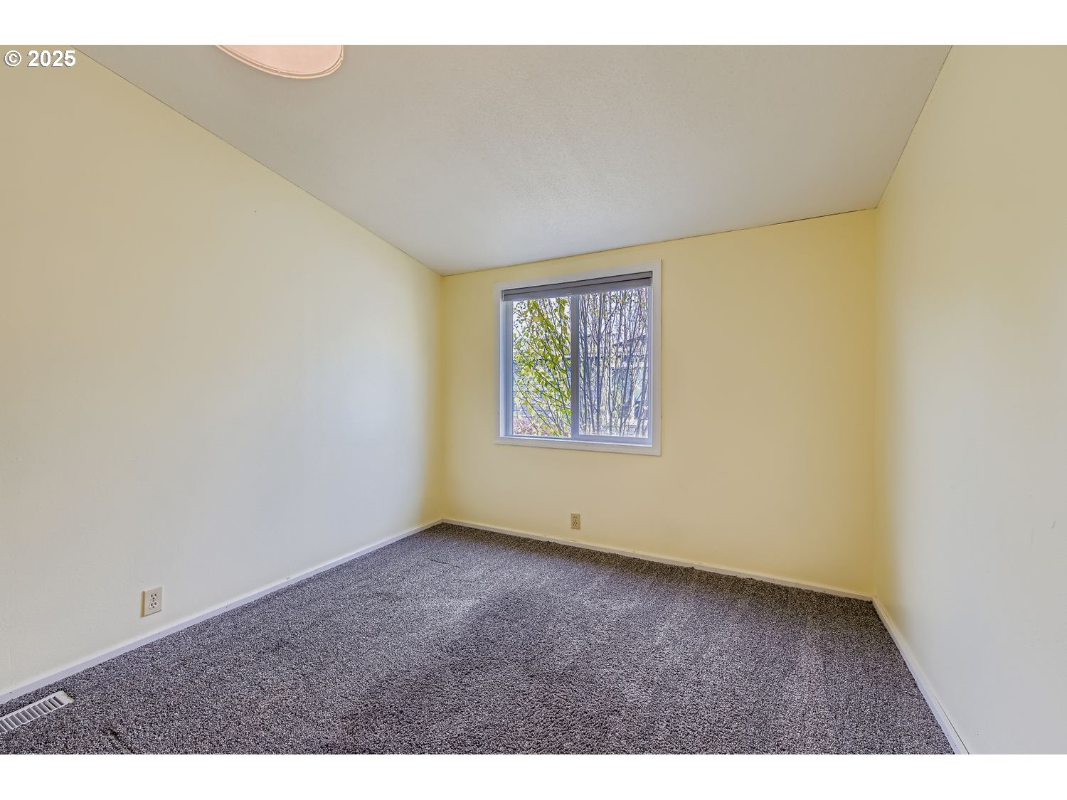 100 Southwest 195th Avenue, Unit 104 Beaverton, OR 97006 - Photo 11 of 23 a view of an empty room with a window