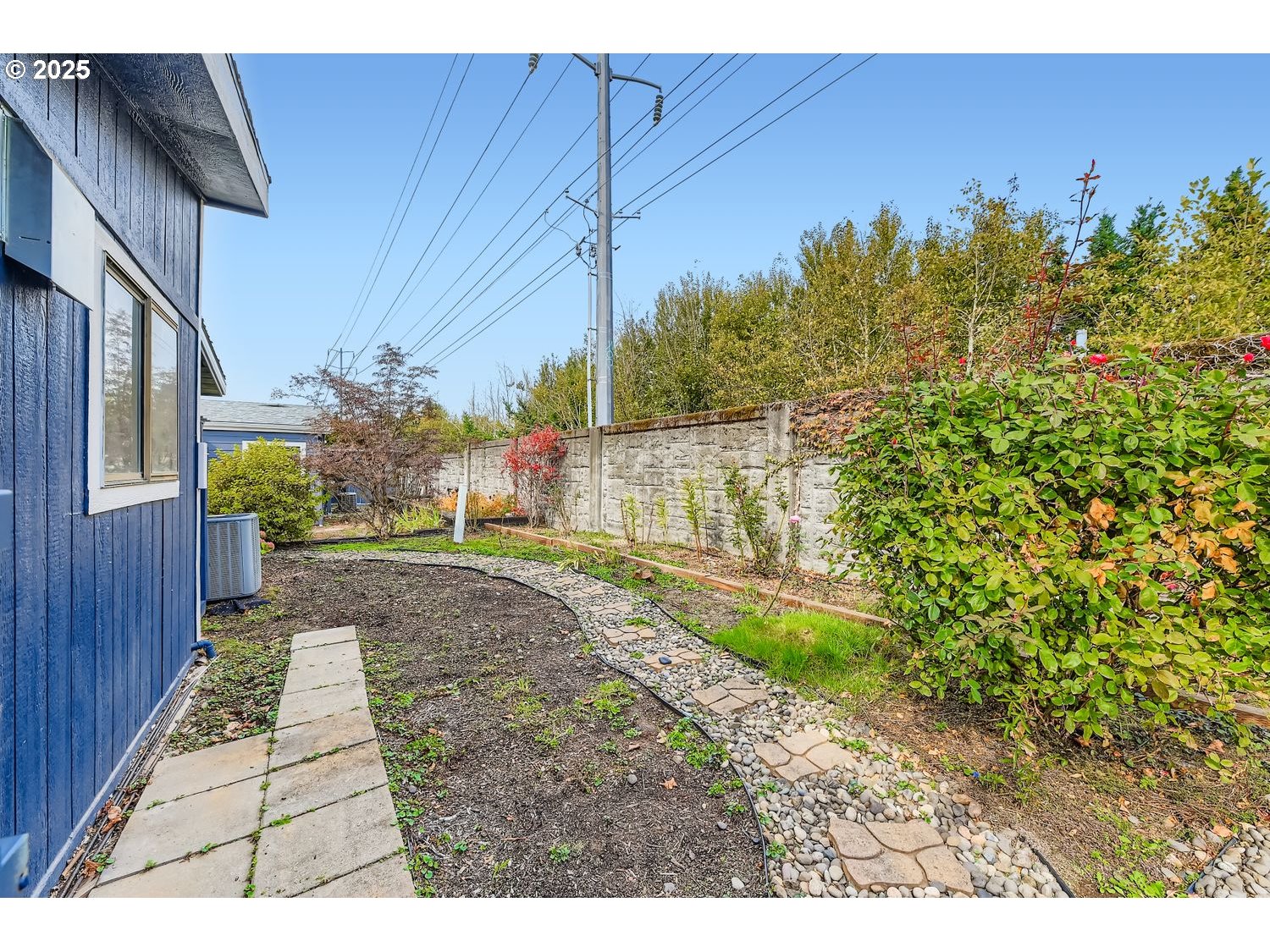 100 Southwest 195th Avenue, Unit 104 Beaverton, OR 97006 - Photo 16 of 23 a view of a backyard with pathway