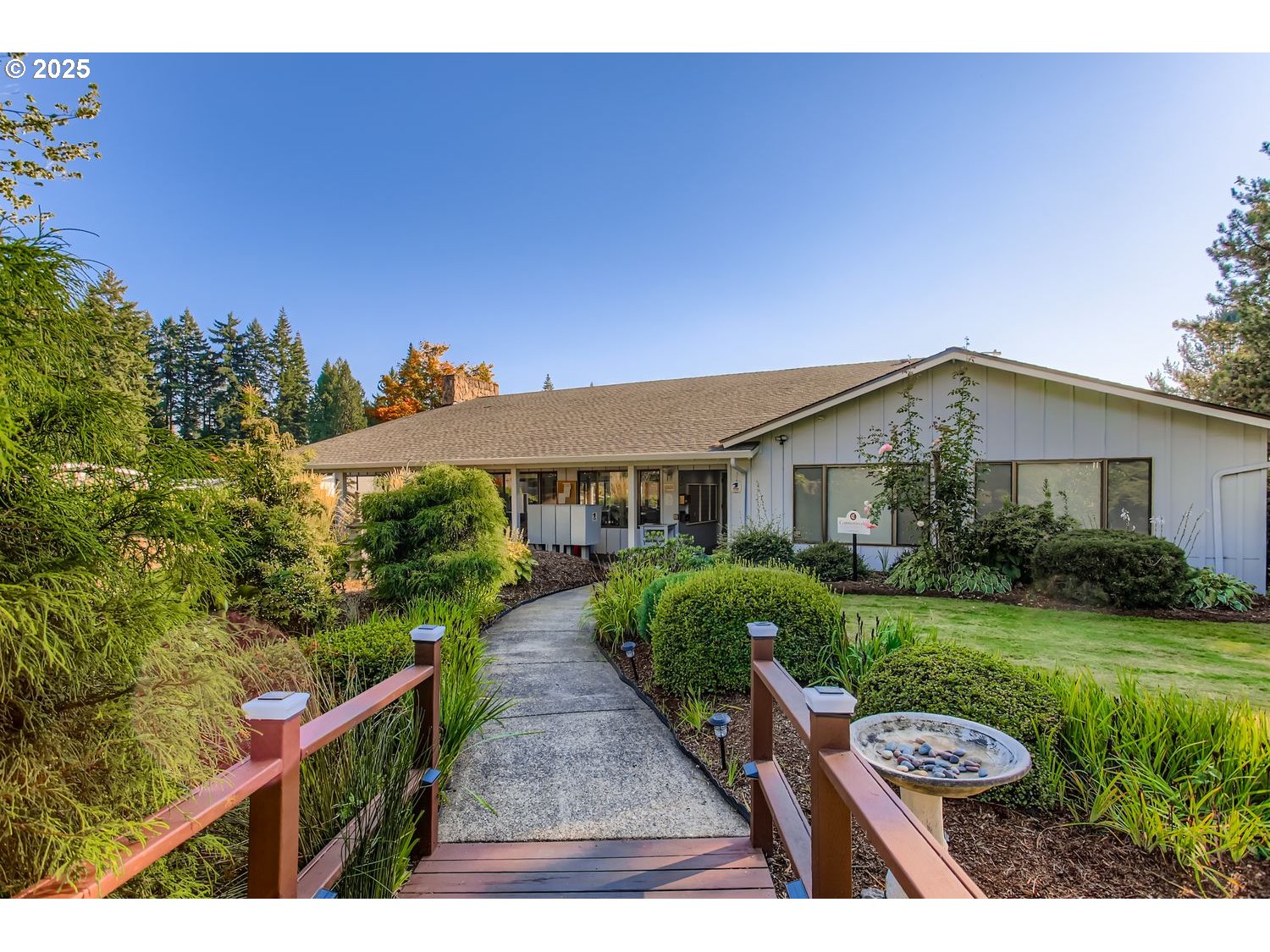 100 Southwest 195th Avenue, Unit 104 Beaverton, OR 97006 - Photo 17 of 23 a view of a house with backyard and garden