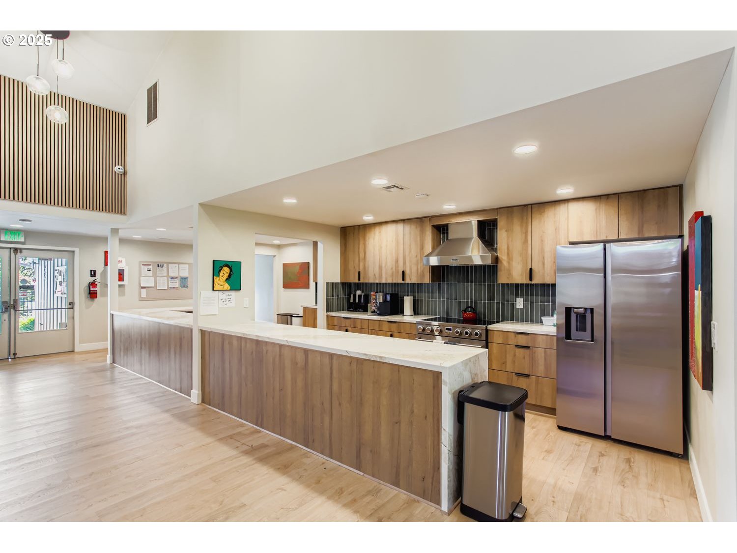 100 Southwest 195th Avenue, Unit 104 Beaverton, OR 97006 - Photo 18 of 23 a kitchen with refrigerator and cabinets