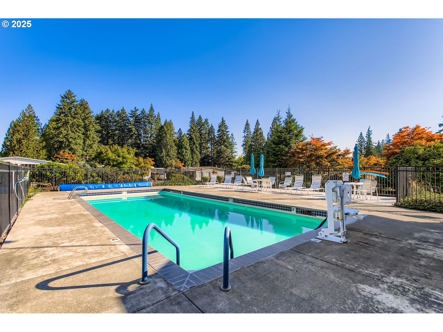 100 Southwest 195th Avenue, Unit 104 Beaverton, OR 97006 - Photo 23 of 23 a view of a swimming pool with a patio