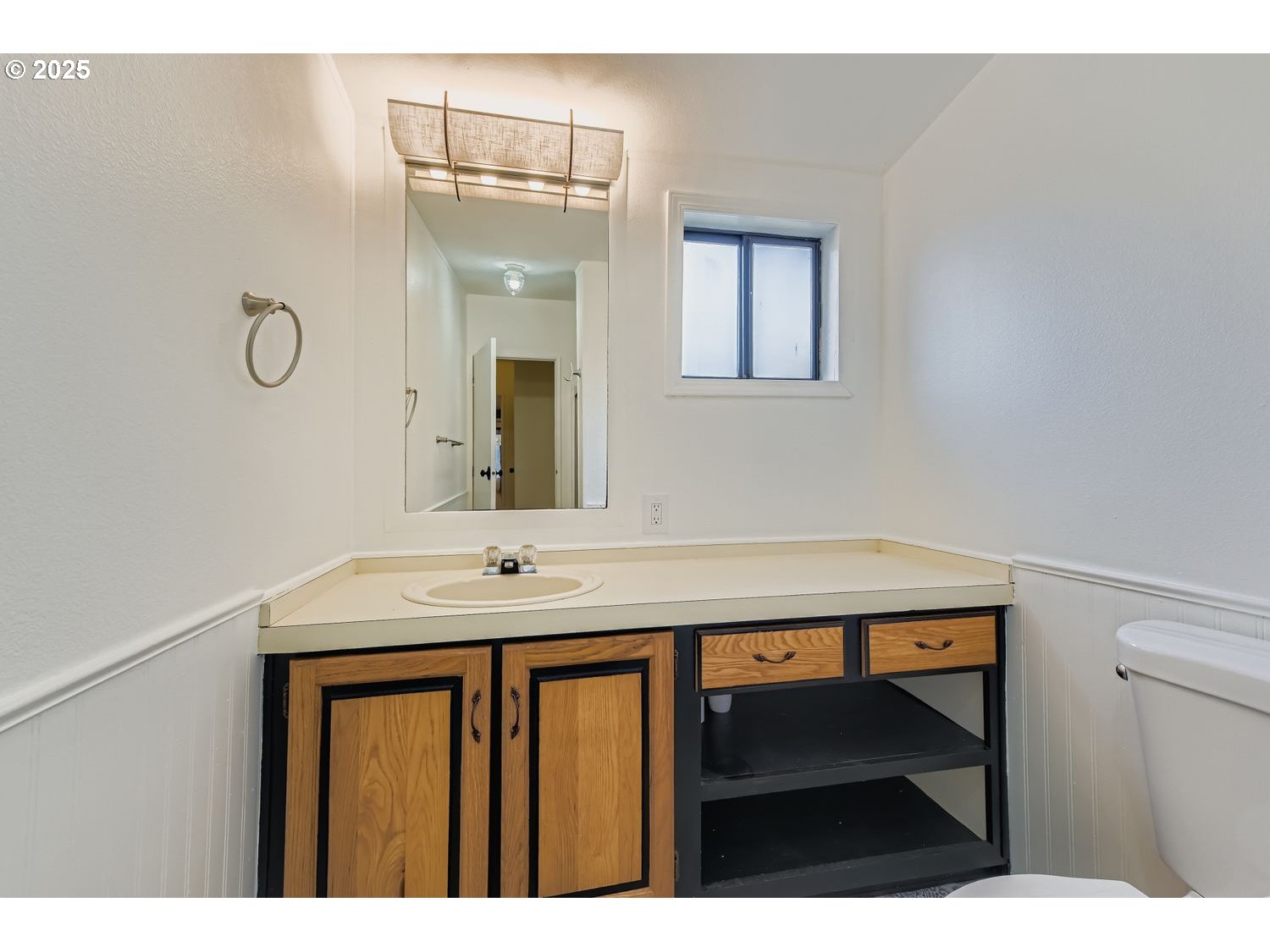 100 Southwest 195th Avenue, Unit 104 Beaverton, OR 97006 - Photo 10 of 23 a bathroom with a sink a vanity and a mirror