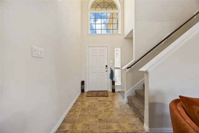 a view of entryway with a front door