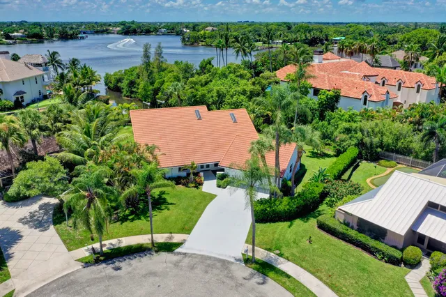 a front view of house with yard and outdoor seating