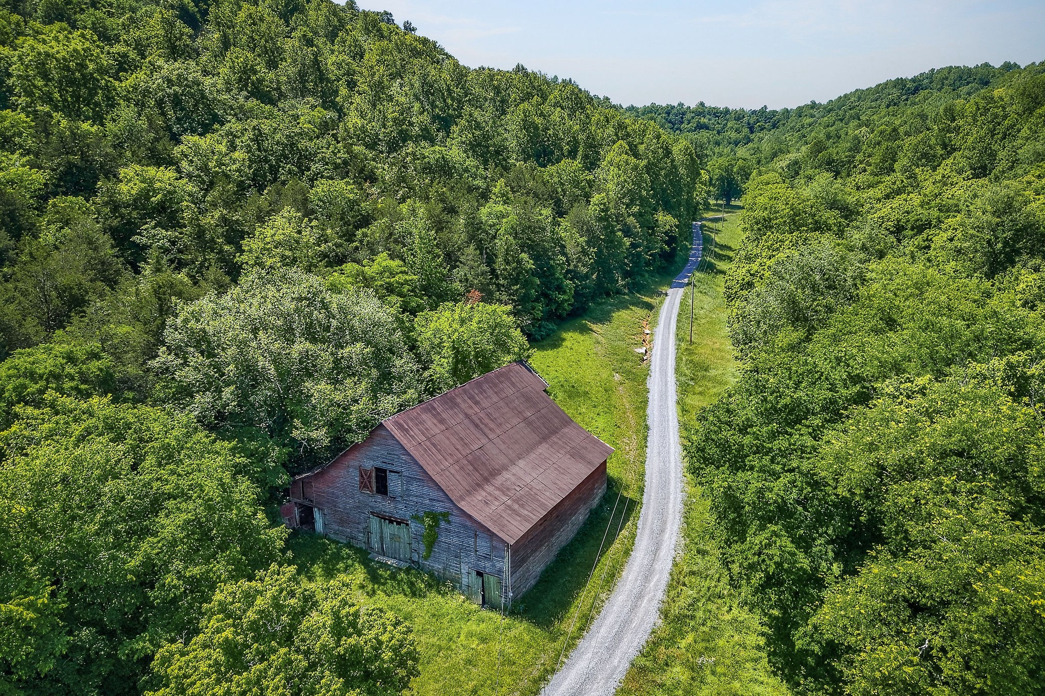 16130 Buffalo Valley Road Silver Point, TN 38582 - Photo 3 of 47 an aerial view of a house with a yard