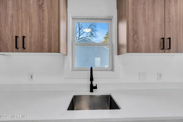 a sink with a cabinet