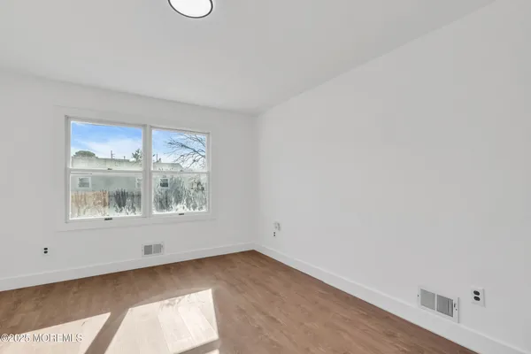 a view of a room that has a window in it