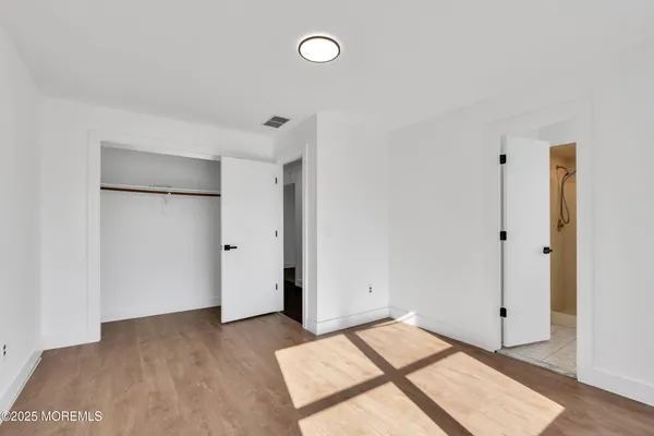 a view of a room with an empty space