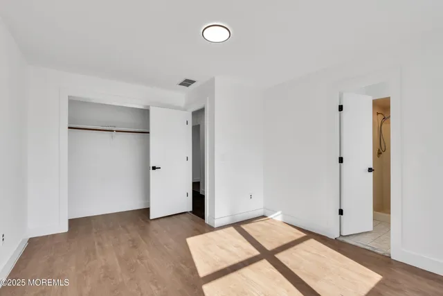 a view of a room with an empty space