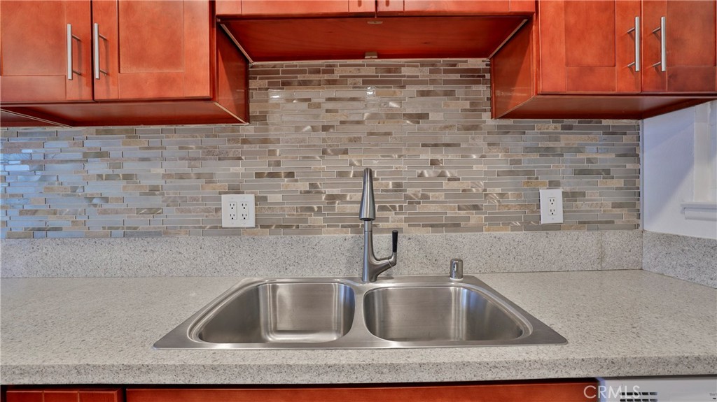 304 Navajo Springs Road Diamond Bar, CA 91765 - Photo 12 of 39 a kitchen with a sink and cabinets