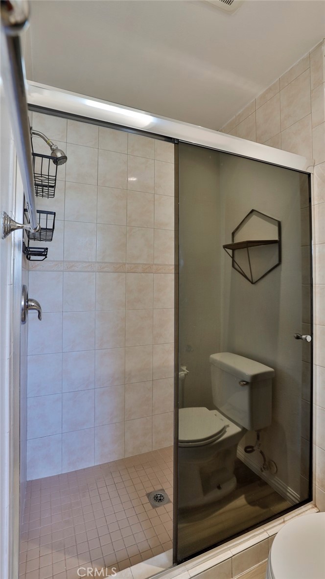 304 Navajo Springs Road Diamond Bar, CA 91765 - Photo 20 of 39 a bathroom with a toilet and a shower