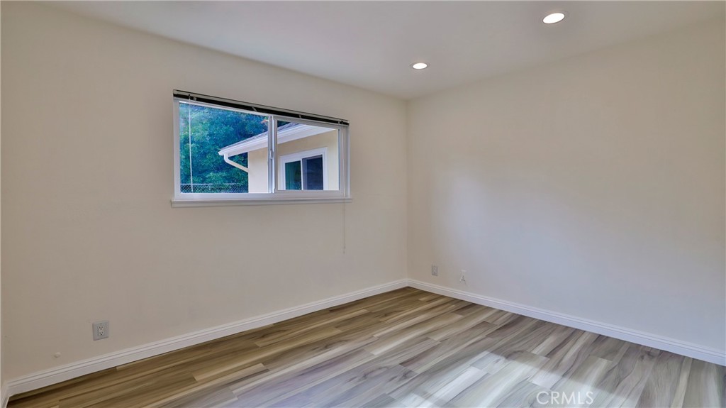 304 Navajo Springs Road Diamond Bar, CA 91765 - Photo 21 of 39 a view of empty room with wooden floor