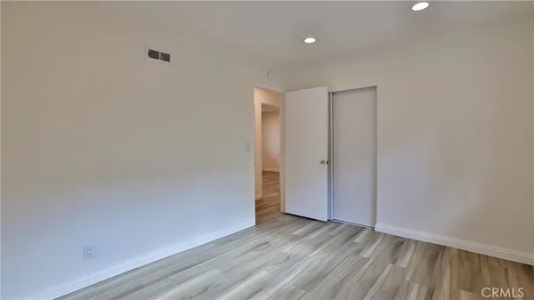 a bathroom with a granite countertop sink mirror and double