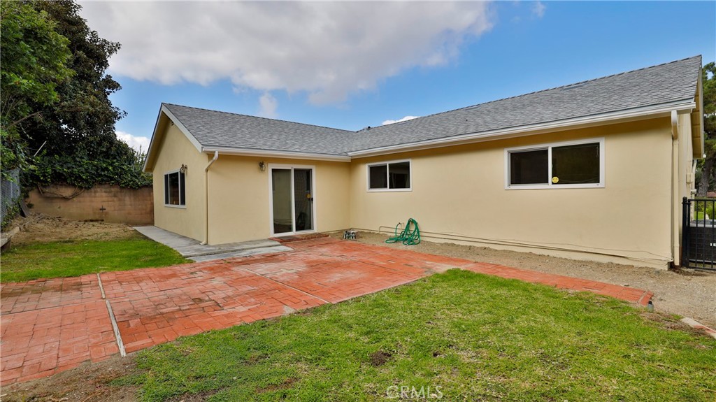 304 Navajo Springs Road Diamond Bar, CA 91765 - Photo 26 of 39 a backyard of a house with plants and trees
