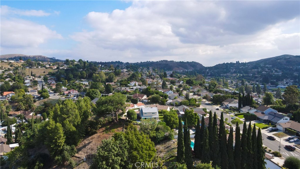 304 Navajo Springs Road Diamond Bar, CA 91765 - Photo 36 of 39 a view of a city with lush green forest