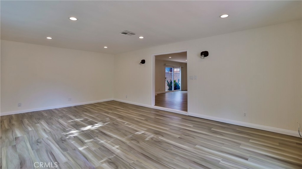 304 Navajo Springs Road Diamond Bar, CA 91765 - Photo 9 of 39 a view of empty room with wooden floor