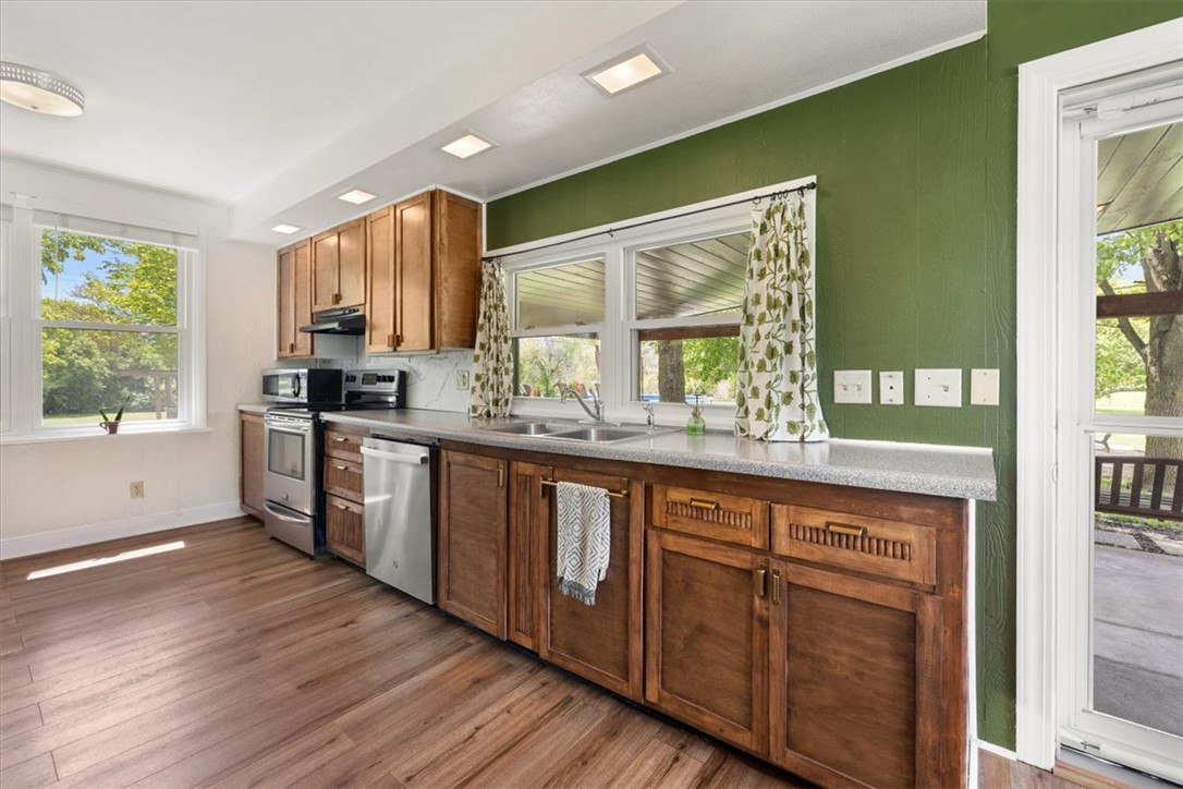 5120 Wheelock Road Troy, OH 45373 - Photo 18 of 67 This spacious kitchen offers ample cabinetry and an inviting atmosphere perfect for casual dining.