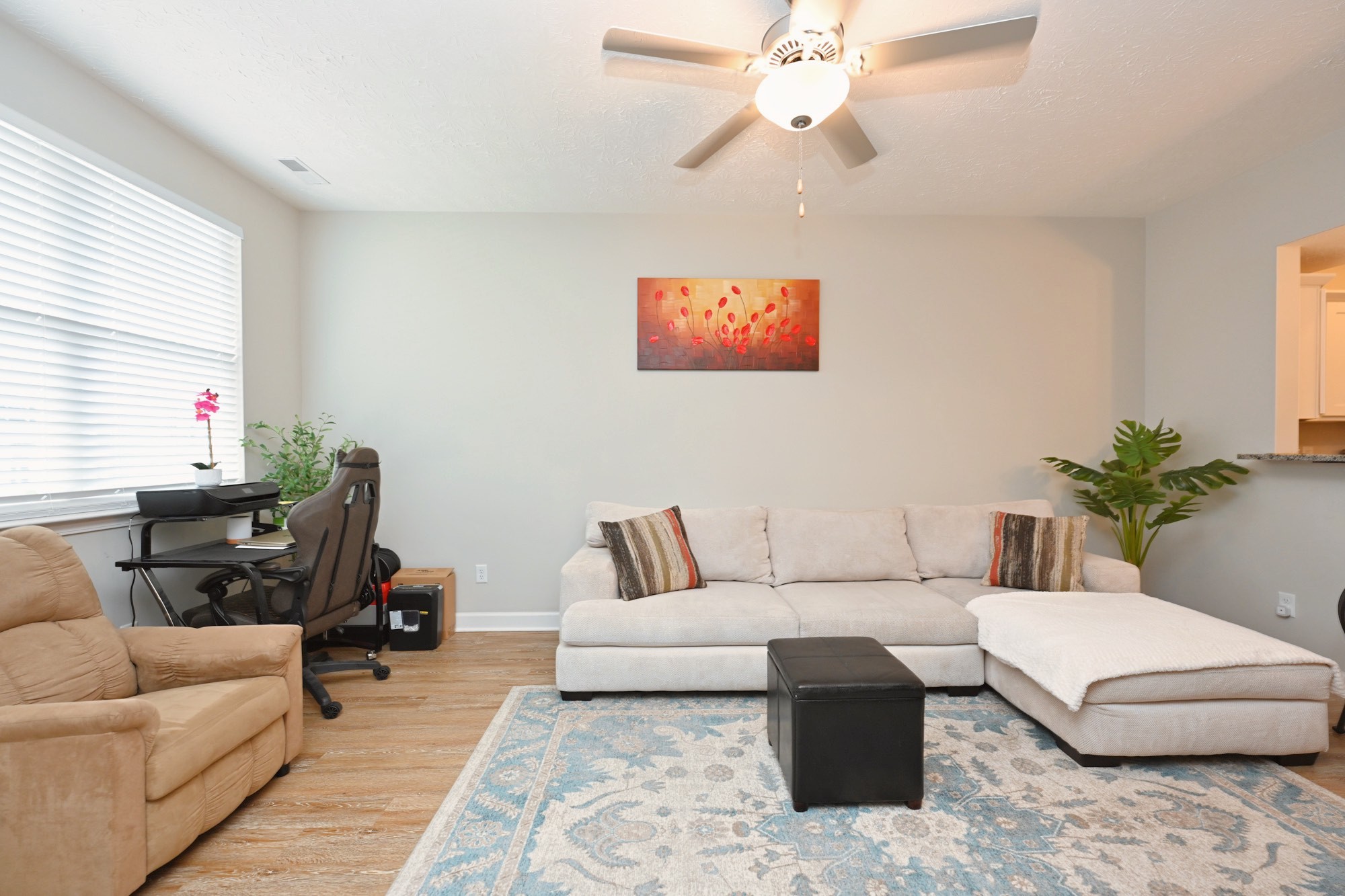 1382 Rural Hill Road, Unit 337 Antioch, TN 37013 - Photo 11 of 45 a living room with furniture and a potted plant