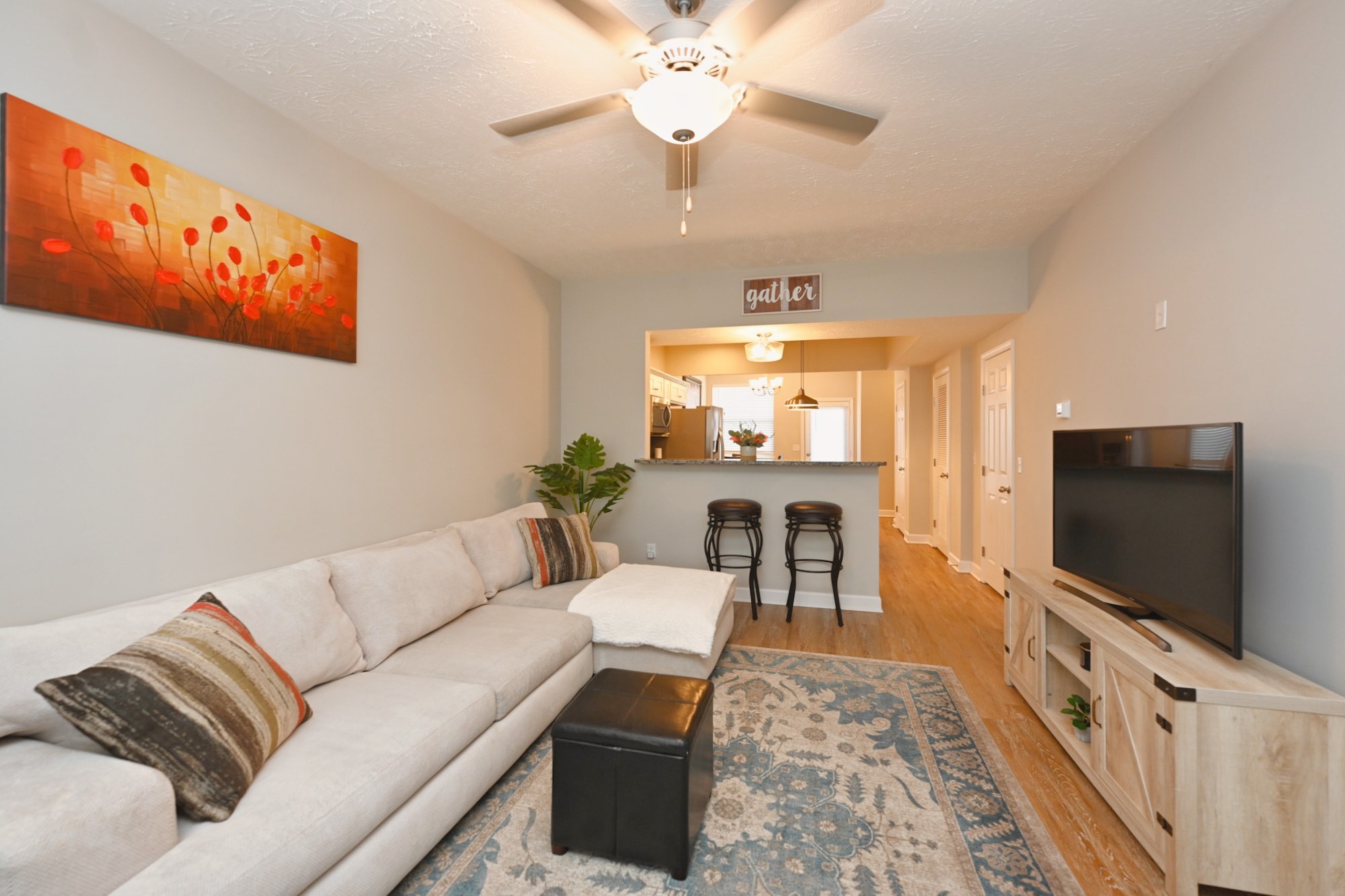 1382 Rural Hill Road, Unit 337 Antioch, TN 37013 - Photo 15 of 45 a living room with furniture and a flat screen tv