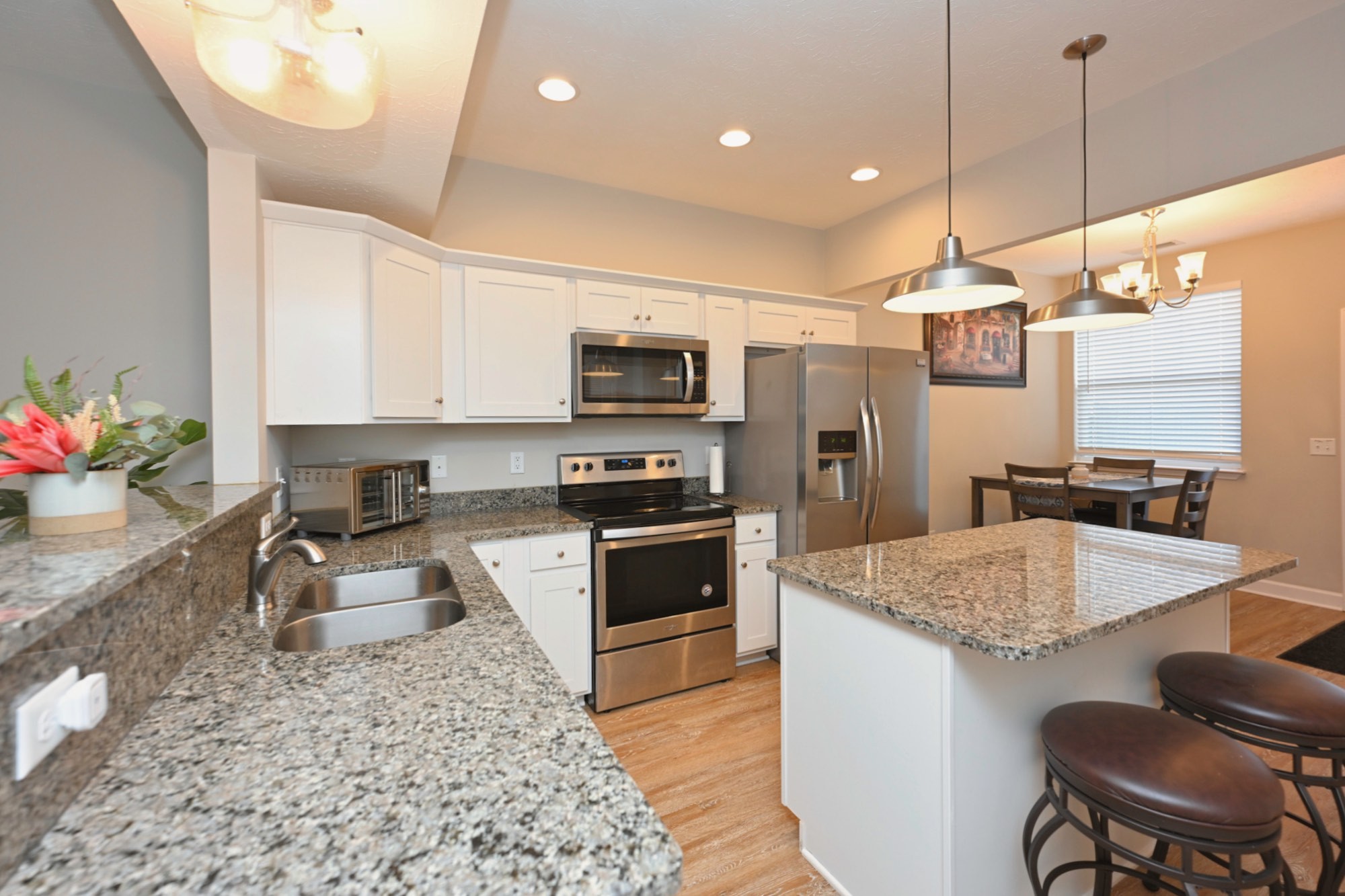 1382 Rural Hill Road, Unit 337 Antioch, TN 37013 - Photo 20 of 45 a kitchen with a sink stove and microwave