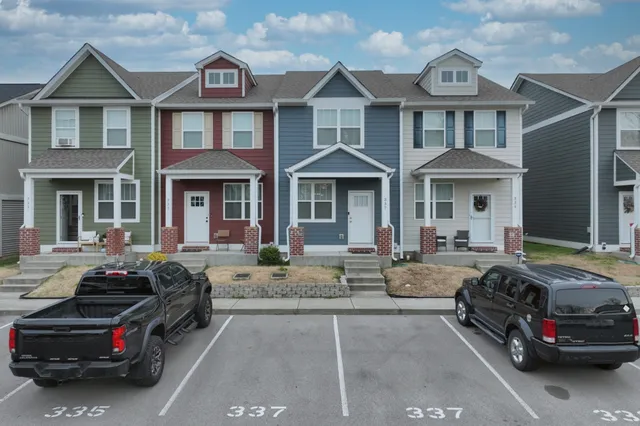 a car parked in front of a house