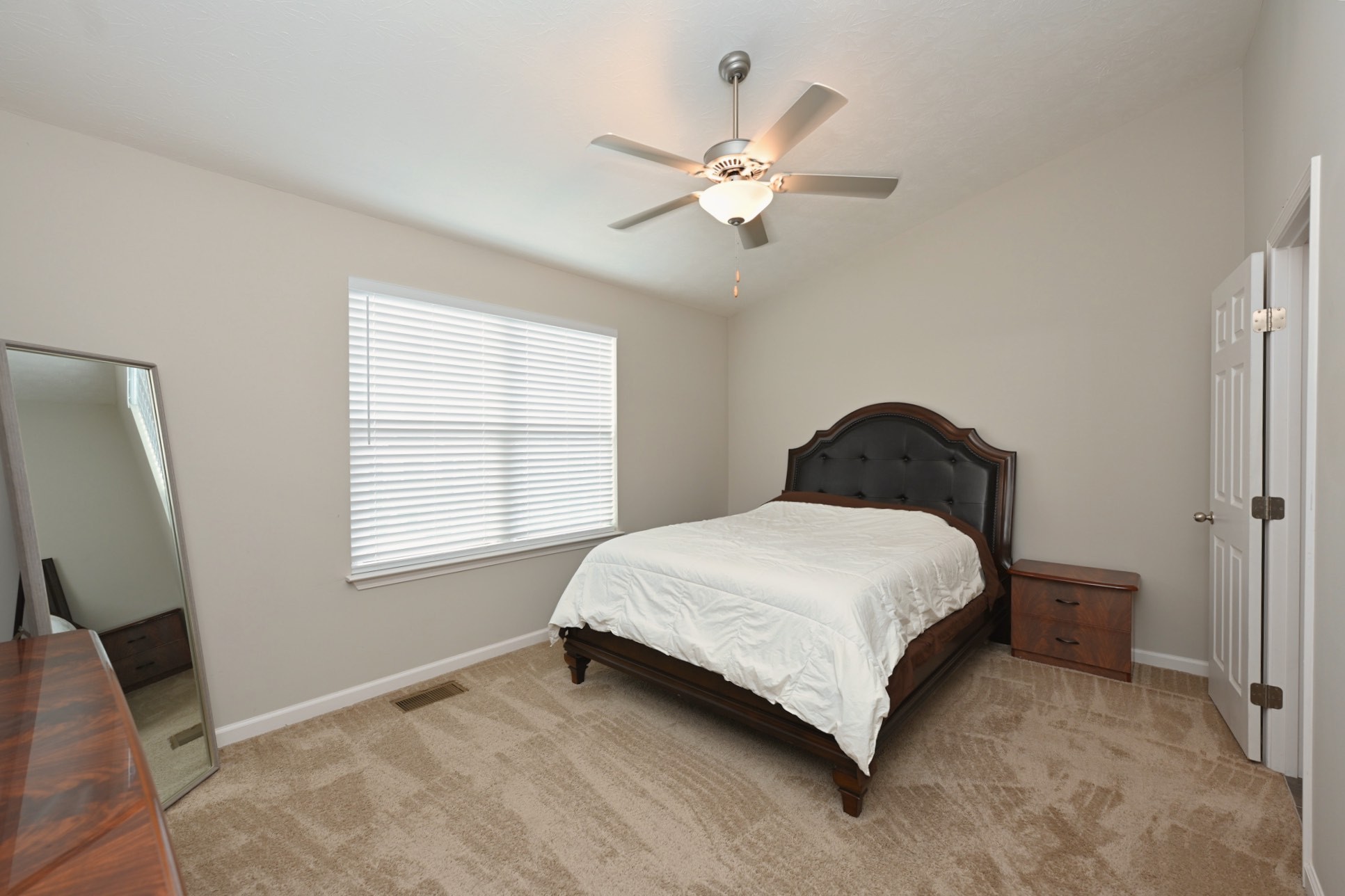 1382 Rural Hill Road, Unit 337 Antioch, TN 37013 - Photo 33 of 45 a bedroom with a bed and a window