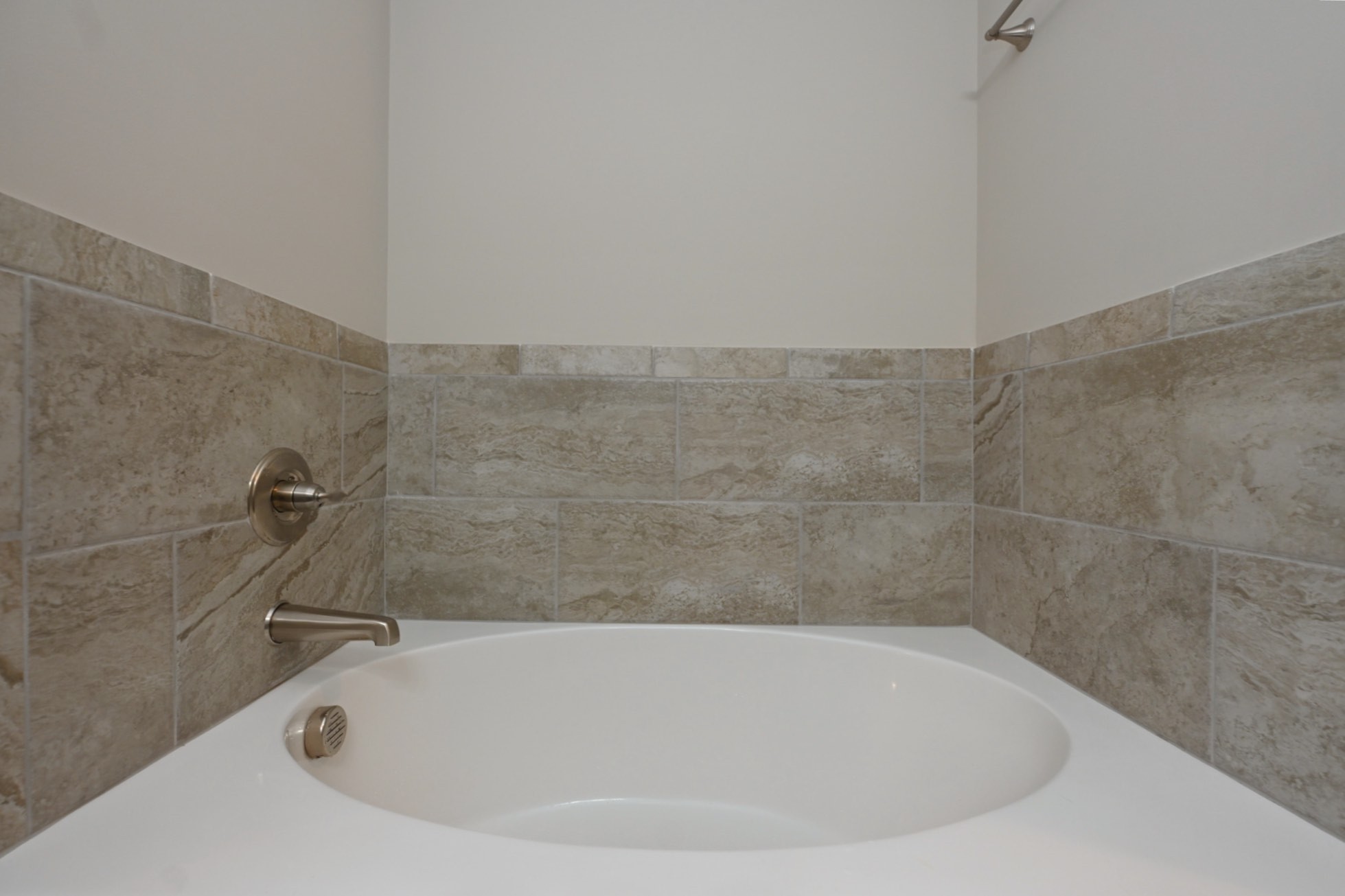 1382 Rural Hill Road, Unit 337 Antioch, TN 37013 - Photo 38 of 45 a bath tub sitting in a bathroom