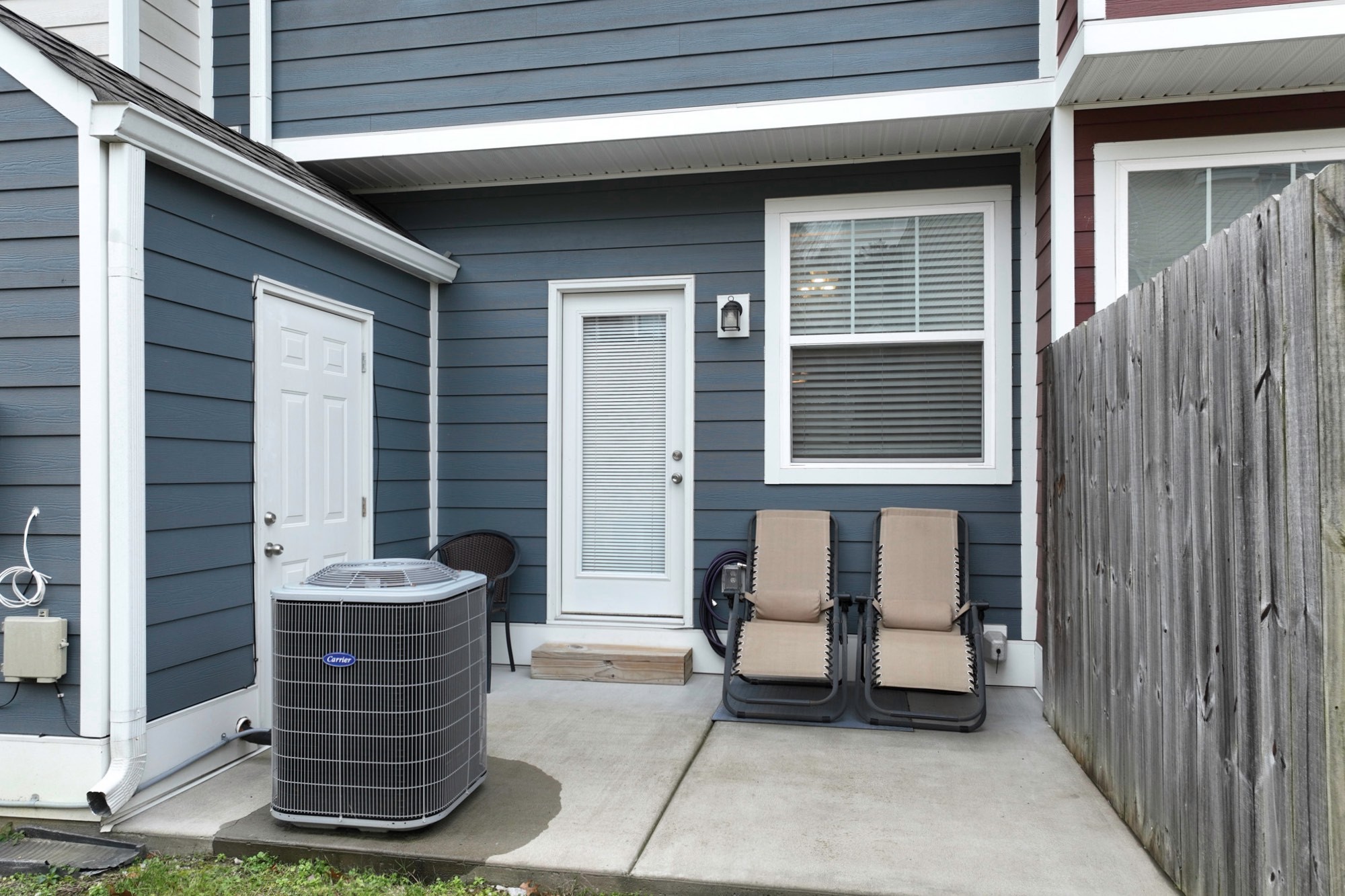 1382 Rural Hill Road, Unit 337 Antioch, TN 37013 - Photo 8 of 45 a front view of a house with a bench
