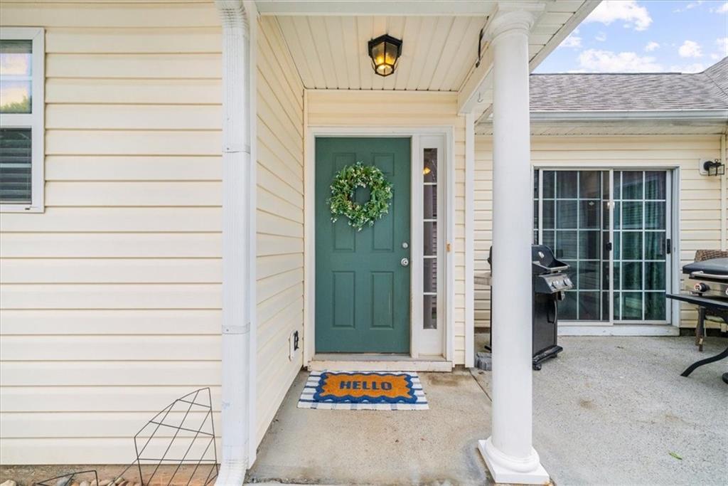 2735 Gateview Court Cumming, GA 30040 - Photo 3 of 35 a view of entrance door of the house